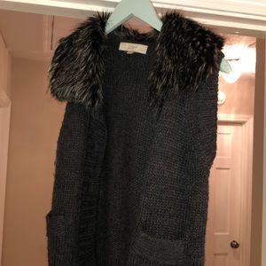 brown and black vest